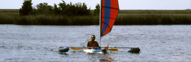 BSD sailing kayak with Batwing sail and Boss outriggers